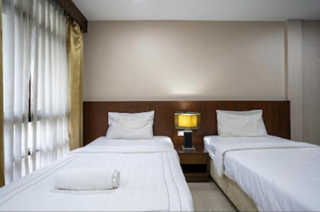 Iraqi Hotel Makkasan Bagian luar foto