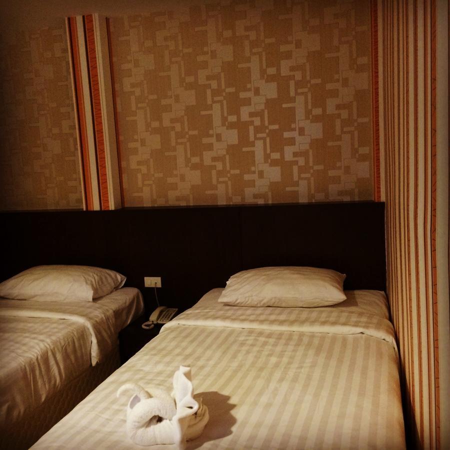 Iraqi Hotel Makkasan Bagian luar foto