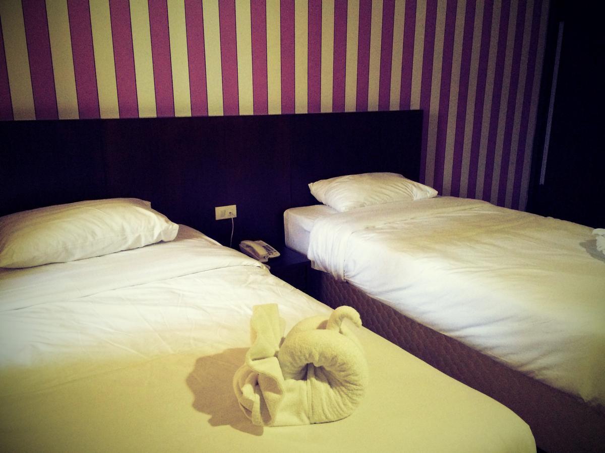 Iraqi Hotel Makkasan Bagian luar foto